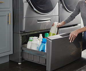 Compartimento de lavadora para guardar detergente