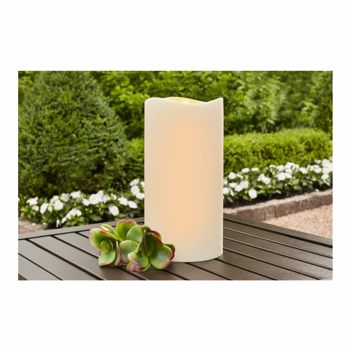 Vela decorativa beige plástica