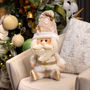 PELUCHE NAVIDEÑO DECORATIVO DE SANTA CLAUS DORADO 57 CM X 20 X 18 CM
