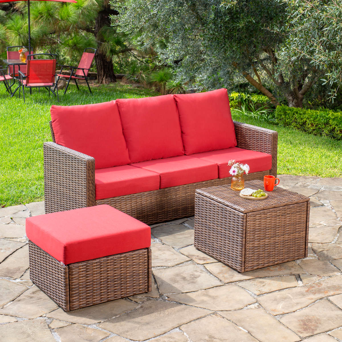 Juego de jardín tipo sala de rattán rojo 3 piezas con baúl y reposapiés